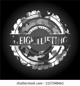 Weightlifting on grey camo texture