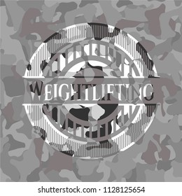 Weightlifting on grey camouflage texture
