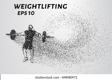 Weightlifting of particles. Athlete raises the bar in the snatch.