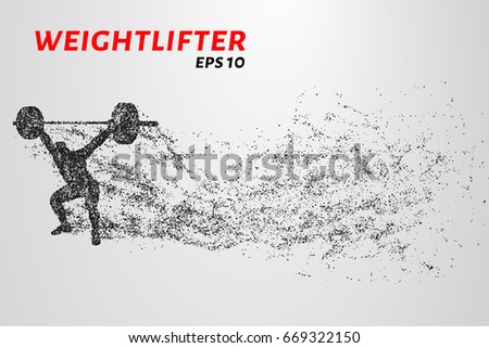 Weightlifting of particles. Athlete raises the bar in the snatch