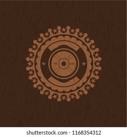 weightlifting or powerlifting plate (45 lbs) icon inside wood emblem. Vintage.