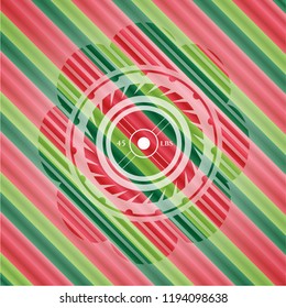 weightlifting or powerlifting plate (45 lbs) icon inside christmas colors style emblem.