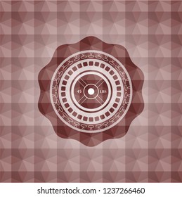 weightlifting or powerlifting plate (45 lbs) icon inside red seamless badge with geometric pattern.