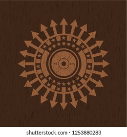 weightlifting or powerlifting plate (45 lbs) icon inside badge with wooden background