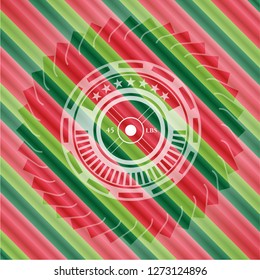 weightlifting or powerlifting plate (45 lbs) icon inside christmas badge background.