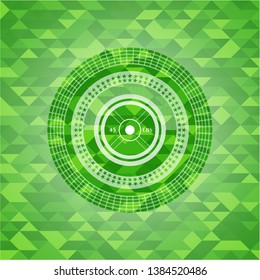 weightlifting or powerlifting plate (45 lbs) icon inside green emblem with triangle mosaic background