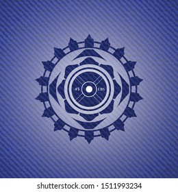 weightlifting or powerlifting plate (45 lbs) icon inside badge with denim texture