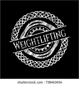 Weightlifting written on a chalkboard