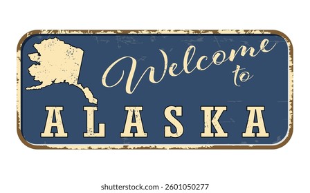 Welcome to Alaska. A worn blue plaque with the name and outline of the state. Welcome inscription on the road sign
