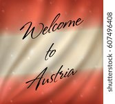 Welcome to Austria text on bokeh styled background with flag of Austria