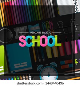Welcome back to school background with colorful typography and an arrangement of realistic study supplies. Vector illustration.