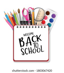 Welcome back to school background with a ring notebook and typography text. A pile of pencils, pens, scissors, spy glass, ruler, brushes and other supplies. Education concept template.