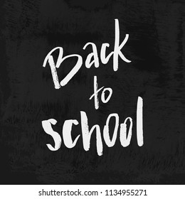 Welcome Back to School chalk lettering on blackboard. Vintage Calligraphic Design Label On Chalkboard. Vector Logo