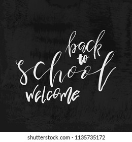 Welcome Back to School chalk lettering on blackboard. Vintage Calligraphic Design Label On Chalkboard. Vector Logo