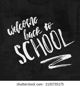 Welcome Back to School chalk lettering on blackboard. Vintage Calligraphic Design Label On Chalkboard. Vector Logo