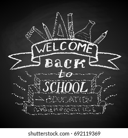 Welcome Back to School. Chalk text and drawing on blackboard.