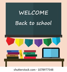 Welcome back to school concept. There are blackboard,books,laptop on the table and colorful party flags in the classroom for celebrate new semester. Space for text or copy, cute flat design background