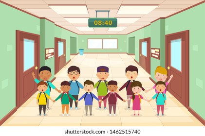 Welcome back to school. Group of children in school corridor front view. Cute school kids.