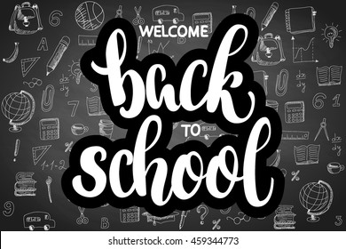 Welcome back to school hand brush lettering, white letters with black backdrop, on dark chalkboard background with hand drawn doodle sketch. Vector illustration.