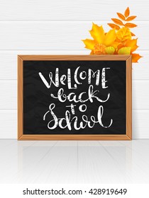 Welcome back to school handdrawn on board. Chalk lettering ower chalkboard, vector illustration