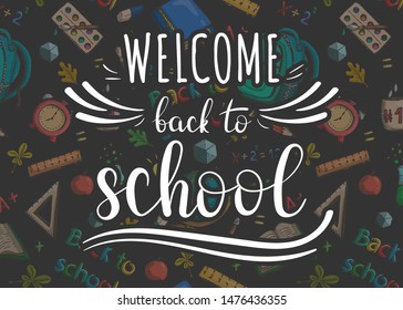 Welcome back to school. Lettering on school accessories background.