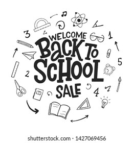 Welcome back to school sale vector hand drawn doodle lettering inscription with decorative elements isolated on white background.