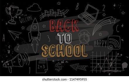  Welcome Back to school text drawing by colorful chalk in blackboard