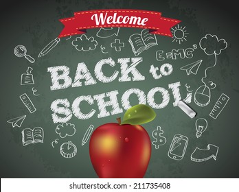 Welcome back to school with text on chalkboard and apple