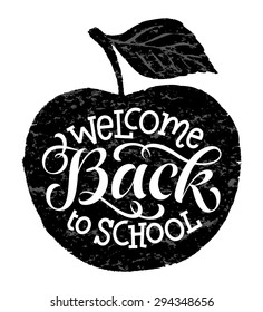 Welcome back to school vector illustration on chalkboard apple. Hand drawn lettering