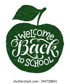 Welcome back to school vector illustration on chalkboard apple background. Hand drawn lettering, calligraphic and typographic elements