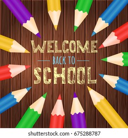 Welcome back to school. Vector  poster with colorful pencils and sketch drawing phrase on wood background