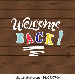 Welcome back text isolated on wooden texure background. Handwriting lettering Welcome. Vector illustration for flyer, school fair, sale, announcement.