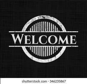 Welcome chalkboard emblem written on a blackboard