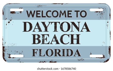 Welcome To Daytona Beach Message on Damaged License Plate