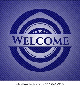 Welcome emblem with denim high quality background