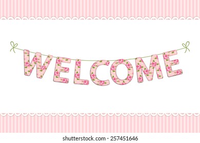 Welcome garland as handmade textile letters with roses in shabby chic style 