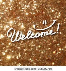 welcome, handwritten text with shadow on golden shiny background