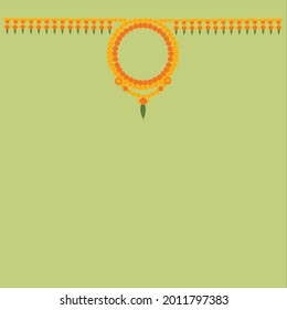 welcome hanging floral decoration with marigold flowers in yellow and orange color on off light green background.