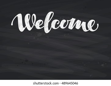 Welcome inscription calligraphy. Hand drawn lettering on blackboard. Vector illustration