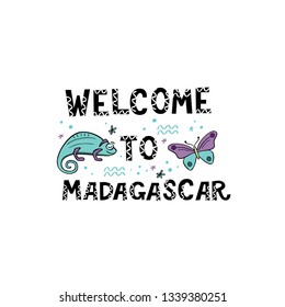 Welcome to Madagascar. Handlettering frase with handdrawn chameleon and butterfly with design elements.