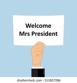 Welcome Mr President on blank white board in hand with blue background