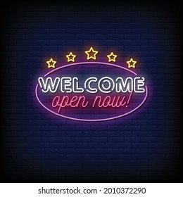 Welcome Open Now Neon Signboard On Brick Wall