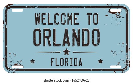 Welcome To Orlando, Florida Message on Damaged License Plate