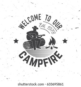 Welcome to our campfire. Vector illustration. Concept for shirt or logo, print, stamp or tee. Vintage typography design with Camper tent and forest silhouette. Camping and outdoor adventure emblem.