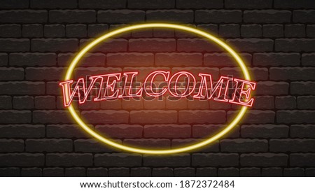
Welcome red neon light illuminated on brick wall