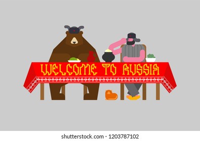 Welcome to Russia. Russian man and bear at table. National folk beast  
