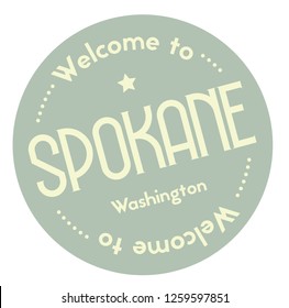 Welcome to Spokane Washington tourism badge or label sticker. Isolated on white. Vacation retail product for print or web.