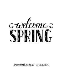 Welcome spring lettering handwritten with black ink isolated on white  background. Romantic text. Modern calligraphy for greeting card design. 