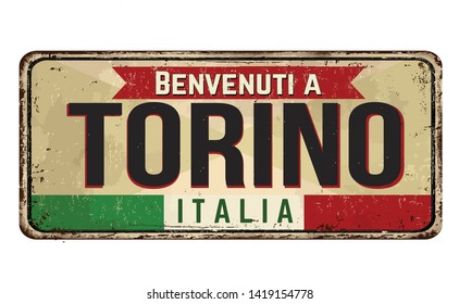 Welcome to Torino (in italian language),vintage rusty metal sign on a white background, vector illustration