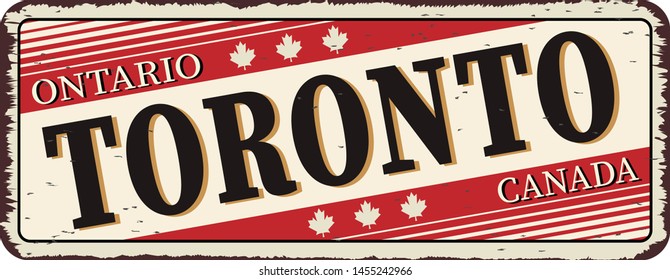 Welcome to Toronto Canada rusty old enamel sign on white background